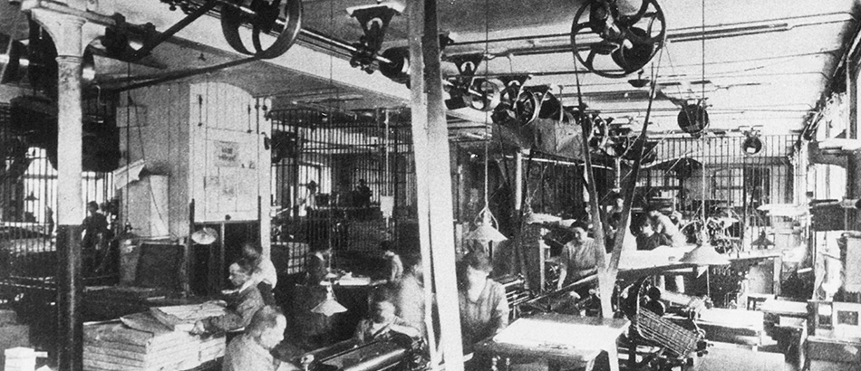 Factory hall, presumably a printing hall, around 1900-1920, source: Sozialarchiv, Zurich.